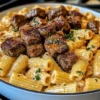 Cajun Steak Tipps in käsiger Rigatoni Parmesan Soße