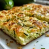 Zucchini Scarpaccia Rezept Zutaten: - 500 g Zucchini - 2 Eier - 100 g Mehl - 200 ml Milch - 50 g Parmesan, gerieben - Salz - Pfeffer - 1 Prise Muskatnuss - Öl zum Braten Anleitung: 1. Zucchini waschen und in dünne Scheiben schneiden. 2. Eier in einer Schüssel verquirlen. 3. Mehl, Milch, Parmesan, Salz, Pfeffer und Muskatnuss hinzufügen und gut vermischen. 4. Zucchini unter den Teig heben. 5. Öl in einer Pfanne erhitzen und die Zucchinimischung hineingeben. 6. Auf beiden Seiten goldbraun braten. 7. Warm servieren.